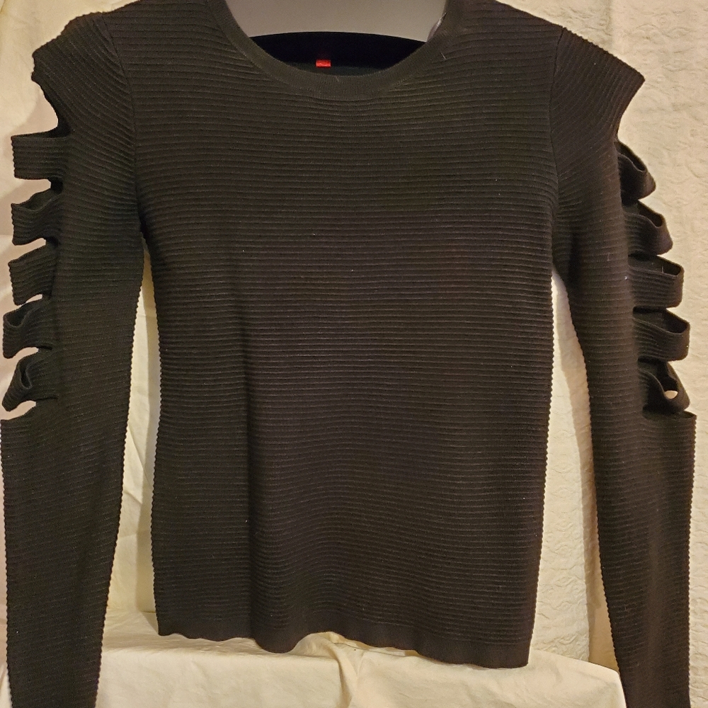 Jennifer Lopez open sleeve sweater